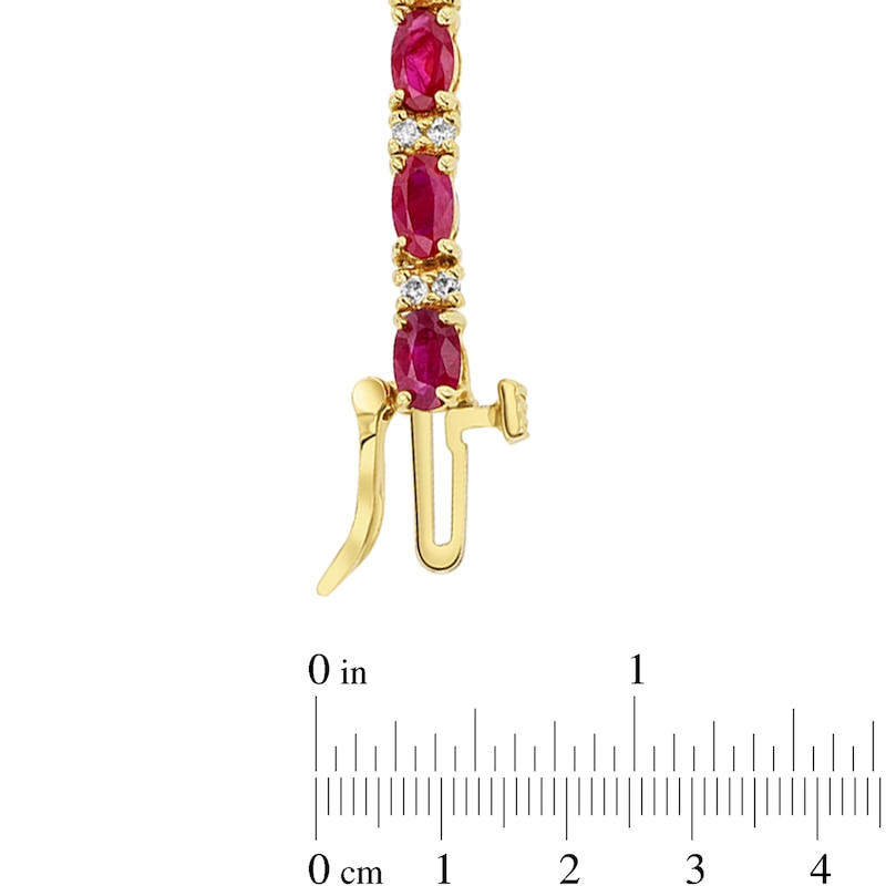 Main Image 3 of Oval Ruby and 1/2 CT. T.W. Diamond Alternating Line Bracelet in 14K Gold