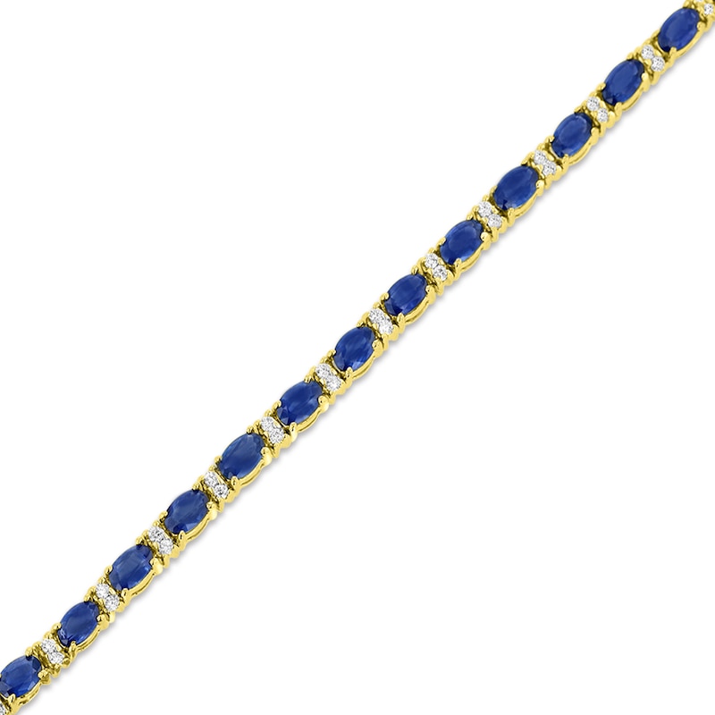Main Image 1 of Oval Blue Sapphire and 1/2 CT. T.W. Diamond Alternating Line Bracelet in 14K Gold
