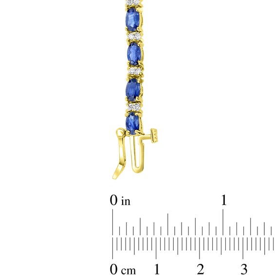 Oval Blue Sapphire and 1/2 CT. T.w. Diamond Alternating Line Bracelet in 14K Gold