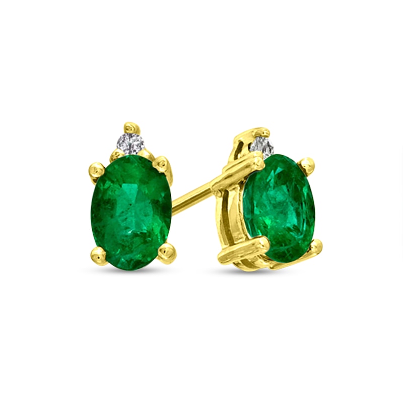 Main Image 1 of Oval Emerald and Diamond Accent Stacked Stud Earrings in 14K Gold