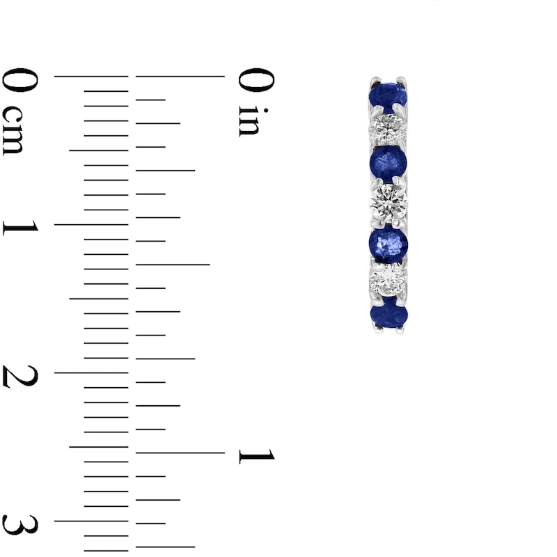 Main Image 2 of Blue Sapphire and 3/8 CT. T.W. Diamond Alternating Seven Stone Huggie Hoop Earrings in 14K White Gold