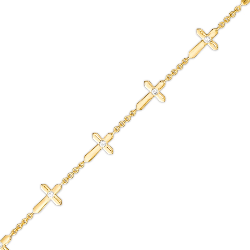 1/8 CT. T.W. Diamond Sideways Gothic-Style Cross Station Bracelet in 10K Gold – 7.25"