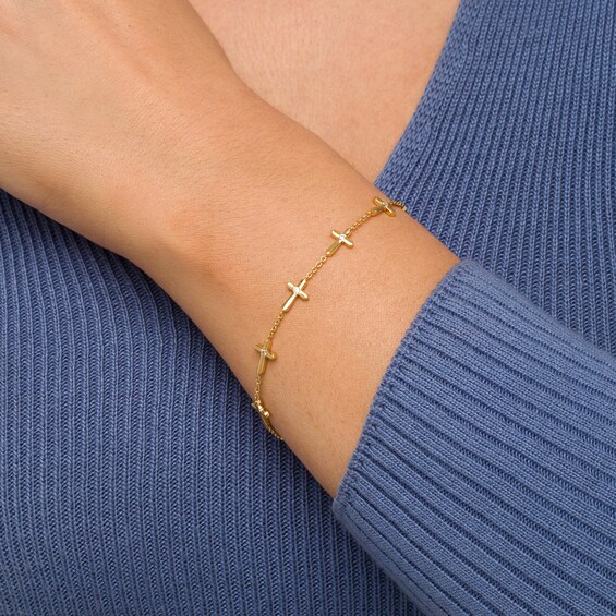 1/8 CT. T.w. Diamond Sideways Gothic-Style Cross Station Bracelet in 10K Gold â 7.25"