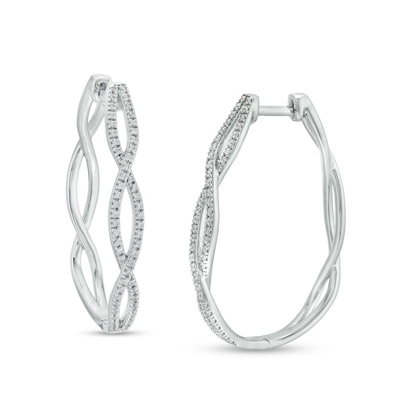 Main Image 1 of 1/2 CT. T.W. Diamond Twist Oval Hoop Earrings in Sterling Silver