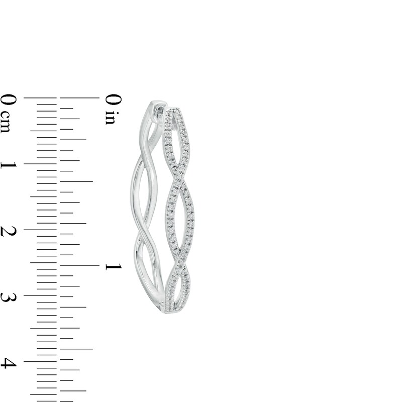 Main Image 3 of 1/2 CT. T.W. Diamond Twist Oval Hoop Earrings in Sterling Silver