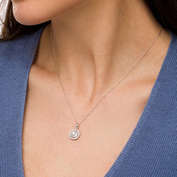 1/2 CT. T.w. Baguette and Round Diamond Double Frame Circle Pendant in 10K White Gold