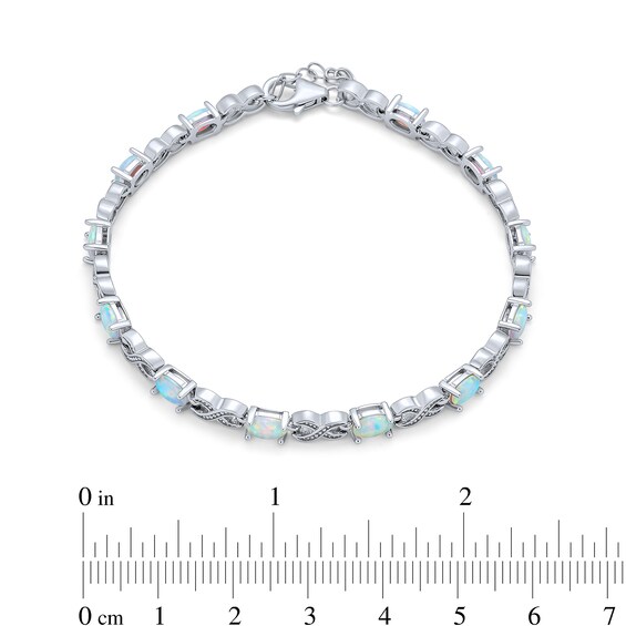 Lab-Created Opal and Infinity Alternating Link Line Bracelet in Sterling Silver - 7.5"