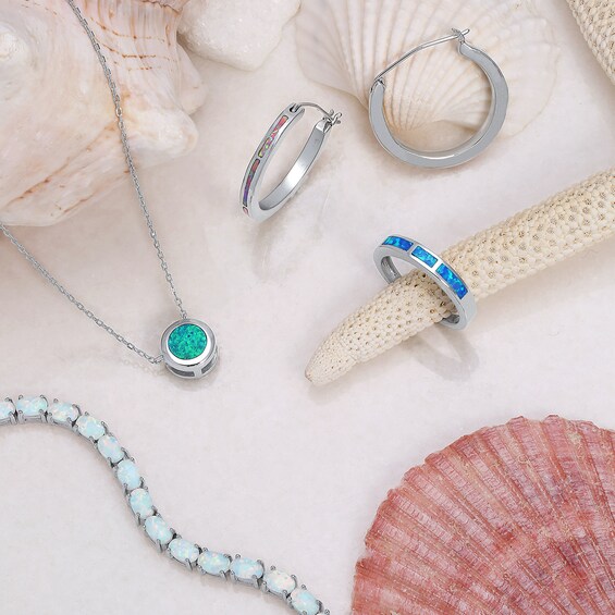 Blue Lab-Created Opal Inlay Three Stone Band in Sterling Silver