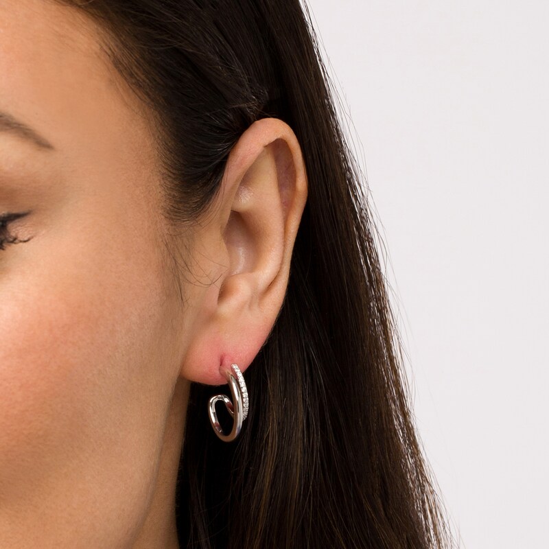 Main Image 2 of 1/6 CT. T.W. Diamond Double Row Curved Huggie Hoop Earrings in Sterling Silver
