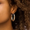 Thumbnail Image 2 of 3.0mm Triple Layered Oval Hoop Earrings in 10K Gold