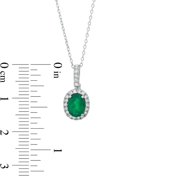 Oval Emerald and 1/8 CT. T.w. Diamond Frame Pendant in 14K White Gold