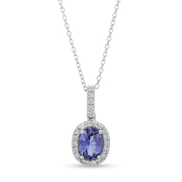 Oval Tanzanite and 1/8 CT. T.W. Diamond Frame Pendant in 14K White Gold