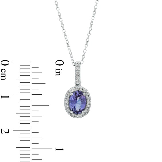 Oval Tanzanite and 1/8 CT. T.w. Diamond Frame Pendant in 14K White Gold
