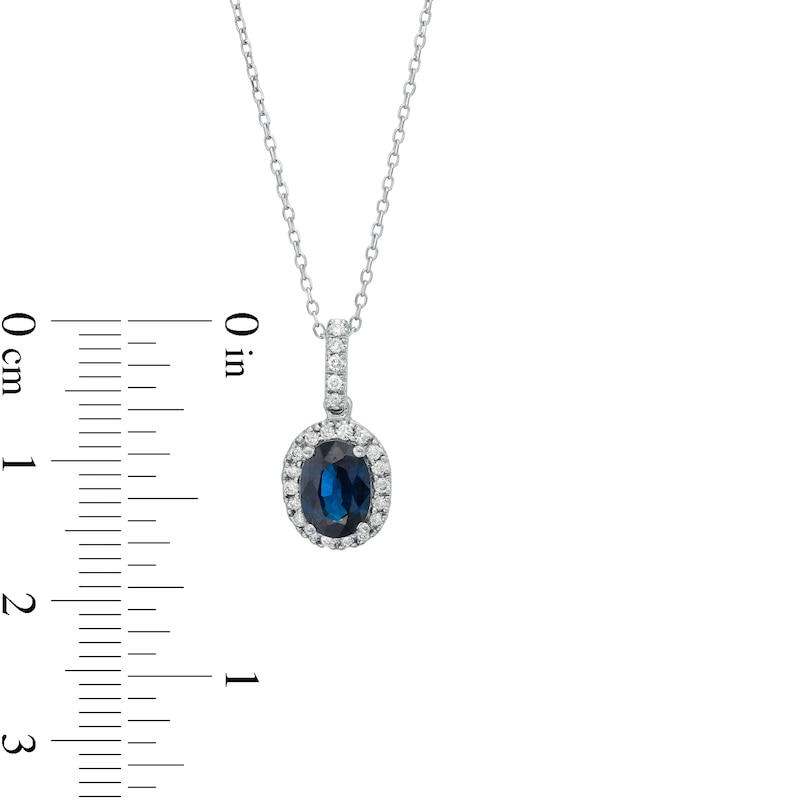 Main Image 4 of Oval Blue Sapphire and 1/8 CT. T.W. Diamond Frame Pendant in 14K White Gold