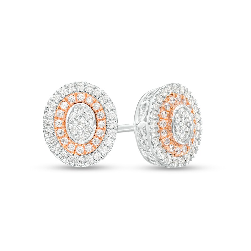 Main Image 1 of 1/6 CT. T.W. Oval-Shaped Multi-Diamond Double Frame Stud Earrings in Sterling Silver and 10K Rose Gold