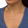 Thumbnail Image 2 of 1/6 CT. T.W. Oval-Shaped Multi-Diamond Double Frame Pendant in Sterling Silver and 10K Rose Gold