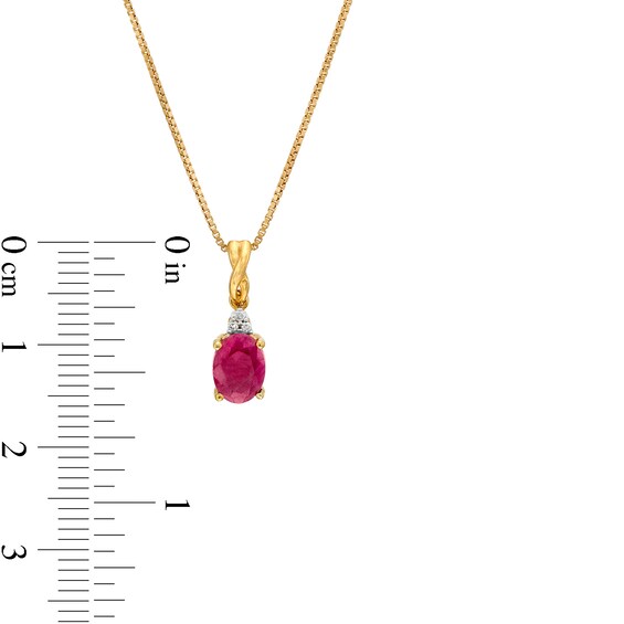 Oval Ruby and Diamond Accent Stacked Twist Bail Pendant in 10K Gold