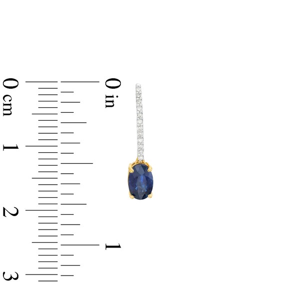 Oval Blue Sapphire and 1/15 CT. T.w. Diamond Drop Earrings in 10K Gold