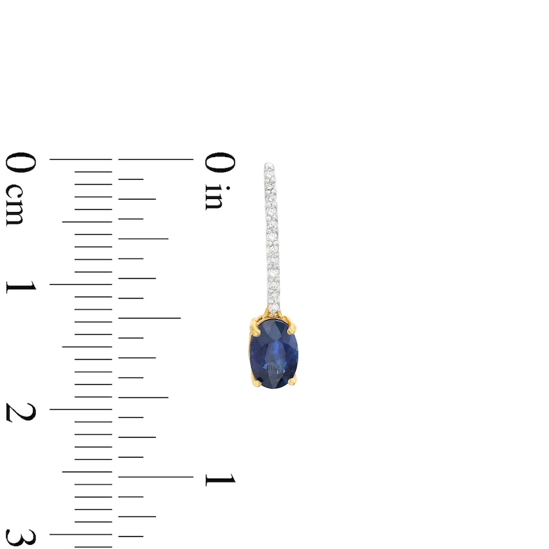Main Image 3 of Oval Blue Sapphire and 1/15 CT. T.W. Diamond Drop Earrings in 10K Gold