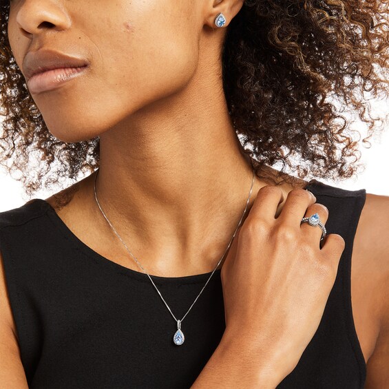 Pear-Shaped Sky Blue Topaz and White Lab-Created Sapphire Frame Three Piece Set in Sterling Silver â Size 7