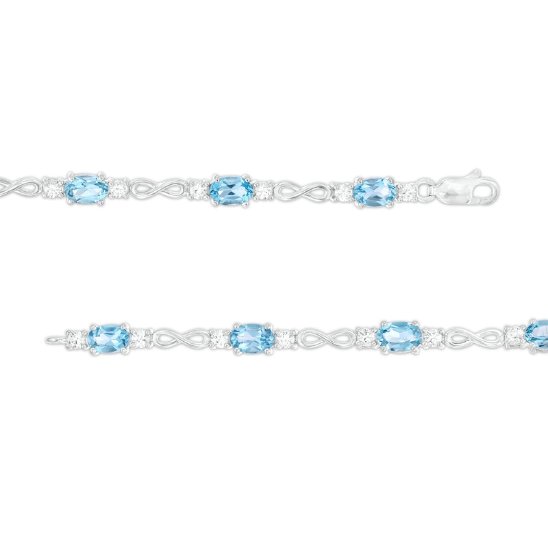 Main Image 3 of Oval Swiss Blue Topaz and White Lab-Created Sapphire Alternating Infinity Loop Link Bracelet in Sterling Silver – 7.25"