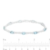 Thumbnail Image 4 of Oval Swiss Blue Topaz and White Lab-Created Sapphire Alternating Infinity Loop Link Bracelet in Sterling Silver – 7.25"