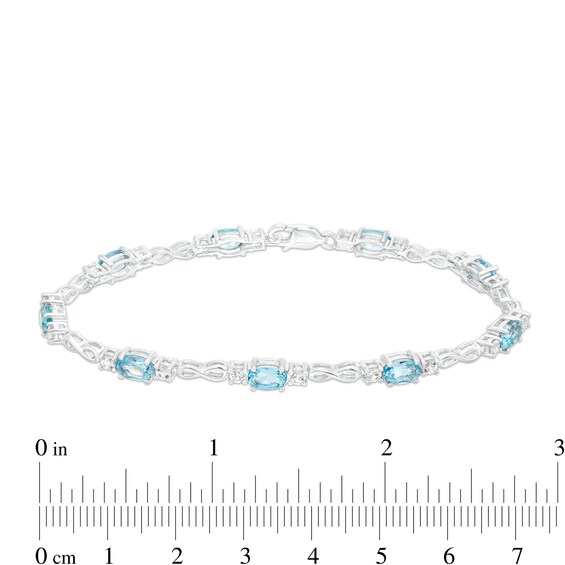 Oval Swiss Blue Topaz and White Lab-Created Sapphire Alternating Infinity Loop Link Bracelet in Sterling Silver â 7.25"