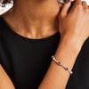 Thumbnail Image 2 of Oval Amethyst and White Lab-Created Sapphire Alternating Infinity Loop Link Bracelet in Sterling Silver – 7.25"