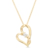 Thumbnail Image 1 of Two in Love 1/10 CT. Diamond Solitaire Crossover Ribbon Tilted Loop Heart Pendant in 10K Gold – 19"