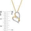 Thumbnail Image 3 of Two in Love 1/4 CT. T.W. Diamond Crossover Ribbon Tilted Loop Heart Pendant in 10K Gold – 19"