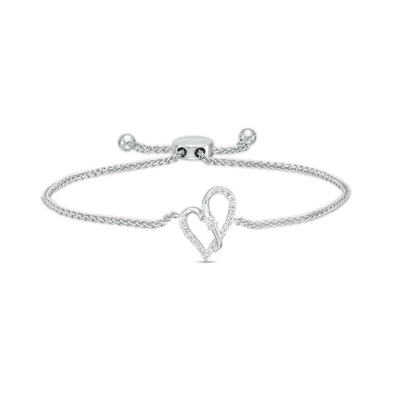 Two in Love 1/6 CT. T.w. Diamond Crossover Ribbon Loop Heart Bolo Bracelet in 10K White Gold – 9.5"
