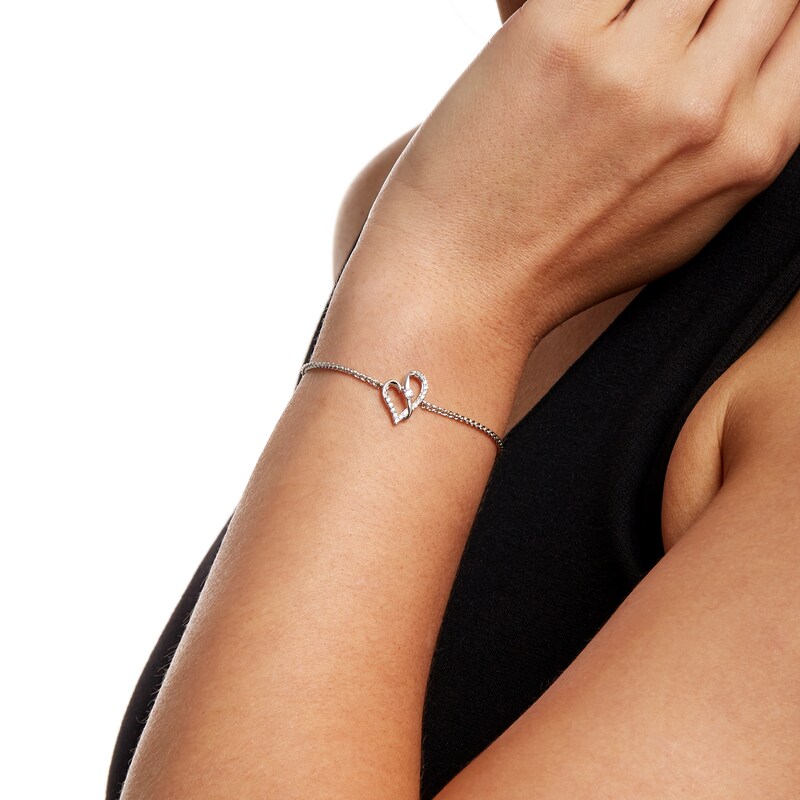 Main Image 2 of Two in Love 1/6 CT. T.W. Diamond Crossover Ribbon Loop Heart Bolo Bracelet in 10K White Gold – 9.5"