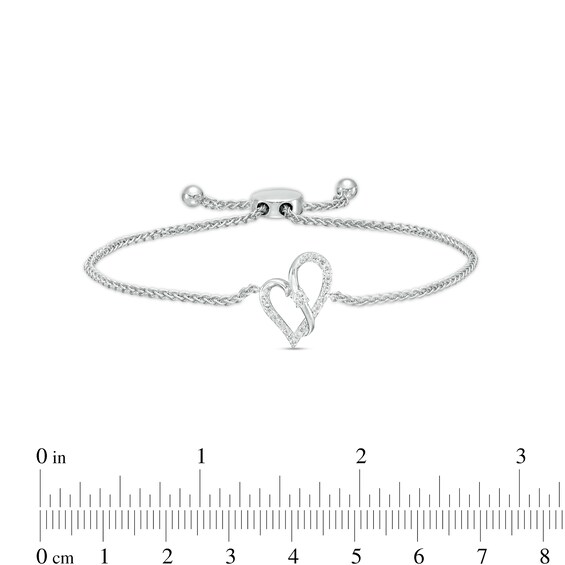 Two in Love 1/6 CT. T.w. Diamond Crossover Ribbon Loop Heart Bolo Bracelet in 10K White Gold – 9.5"