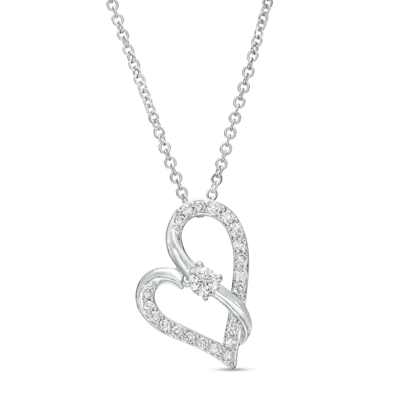 Two in Love 1/4 CT. T.w. Diamond Crossover Ribbon Tilted Loop Heart Pendant in 10K White Gold – 19"