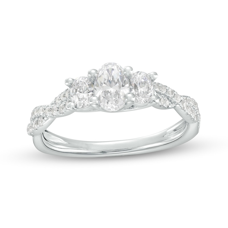 Main Image 1 of 1 CT. T.W. Oval Diamond Past Present Future® Twist Shank Engagement Ring in 14K White Gold