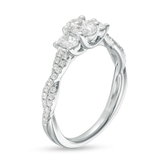 1 CT. T.w. Oval Diamond Past Present FutureÂ® Twist Shank Engagement Ring in 14K White Gold