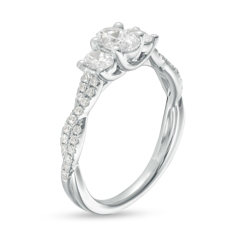 Main Image 3 of 1 CT. T.W. Oval Diamond Past Present Future® Twist Shank Engagement Ring in 14K White Gold