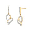 Two in Love 1/3 CT. T.W. Diamond Crossover Ribbon Tilted Loop Heart Drop Earrings in 10K Gold