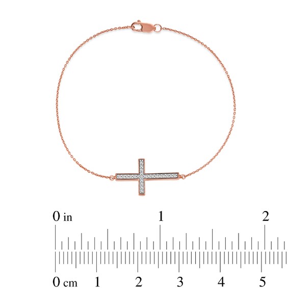 1/8 CT. T.w. Diamond Sideways Cross Bracelet in 10K Rose Gold - 7.25"