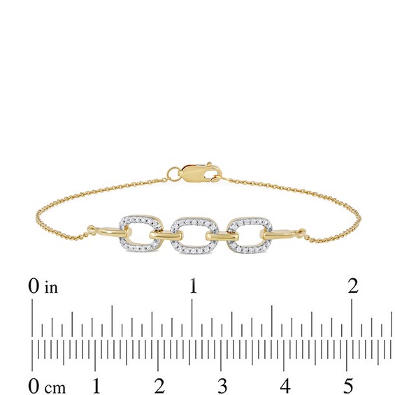 1/8 CT. T.w. Diamond Triple Oval Link Bracelet in 10K Gold - 7.25"