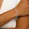 Thumbnail Image 1 of 1/20 CT. T.W. Diamond Alternating Infinity Loop and Heart Bracelet in Sterling Silver – 7.25"