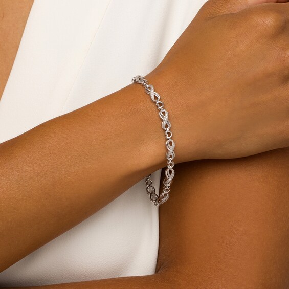 1/20 CT. T.w. Diamond Alternating Infinity Loop and Heart Bracelet in Sterling Silver â 7.25"