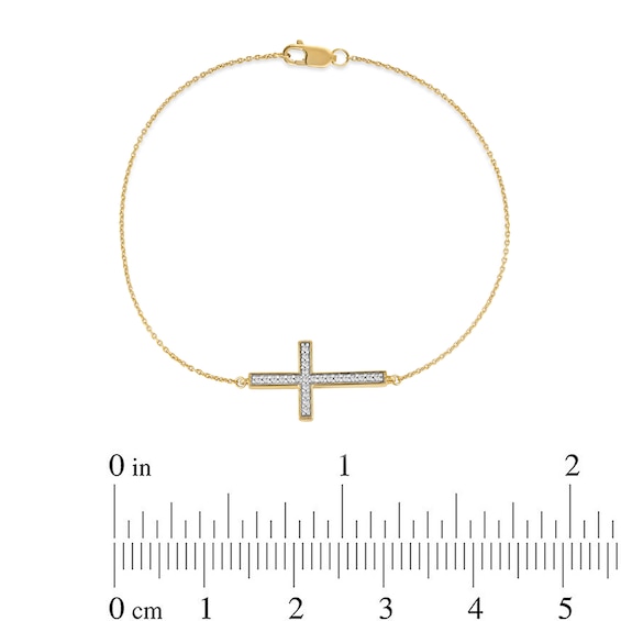 1/8 CT. T.w. Diamond Sideways Cross Bracelet in 10K Gold - 7.25"