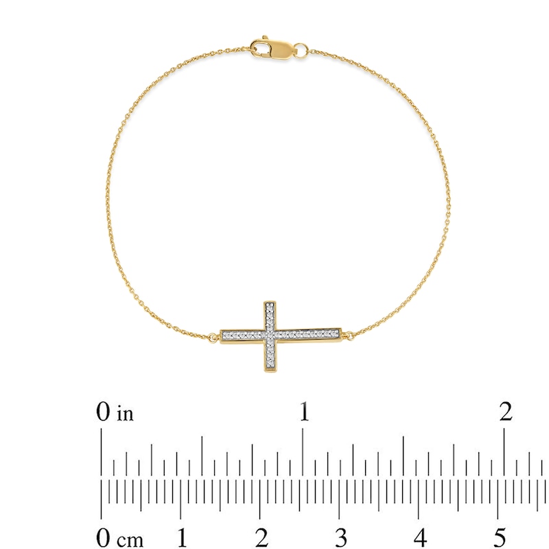 Main Image 4 of 1/8 CT. T.W. Diamond Sideways Cross Bracelet in 10K Gold - 7.25"
