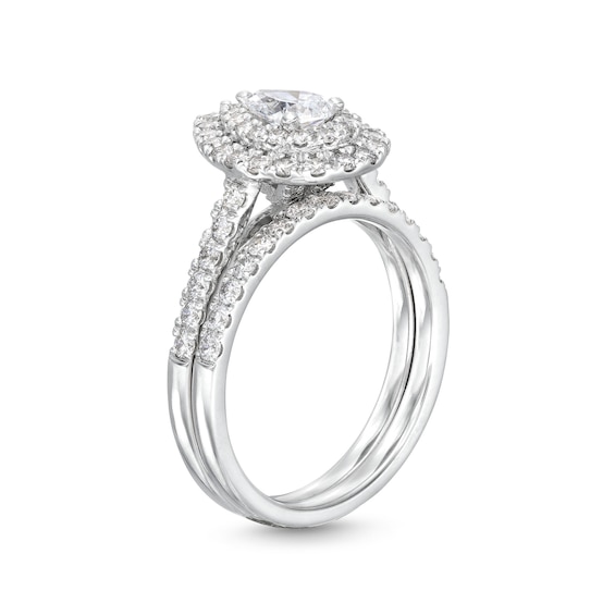 1-1/2 CT. T.w. Pear-Shaped Diamond Frame Bridal Set in 14K White Gold (I/I1)