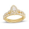 Thumbnail Image 1 of 1-1/2 CT. T.W. Marquise Diamond Frame Alternating Shank Bridal Set in 14K Gold (I/I1)