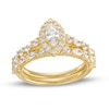 Thumbnail Image 0 of 1-1/2 CT. T.W. Marquise Diamond Frame Alternating Shank Bridal Set in 14K Gold (I/I1)