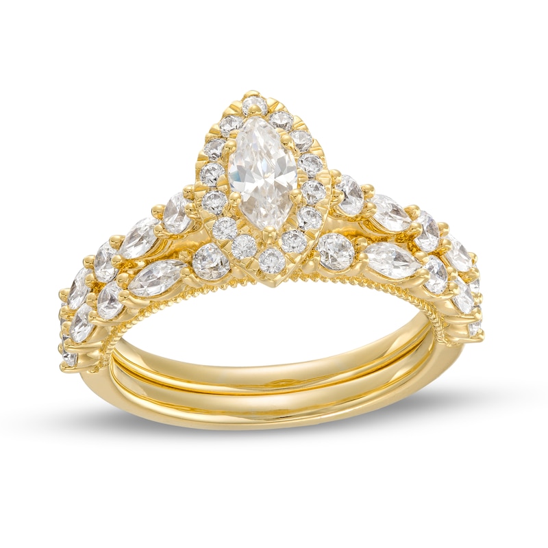 Main Image 1 of 1-1/2 CT. T.W. Marquise Diamond Frame Alternating Shank Bridal Set in 14K Gold (I/I1)
