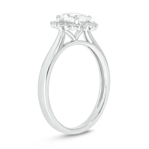 Oval White Lab-Created Sapphire and 1/6 CT. T.w. Diamond Starburst Frame Engagement Ring in 10K White Gold