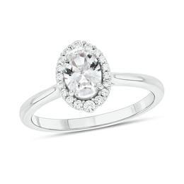 Oval White Lab-Created Sapphire and 1/6 CT. T.W. Diamond Frame Engagement Ring in 10K White Gold